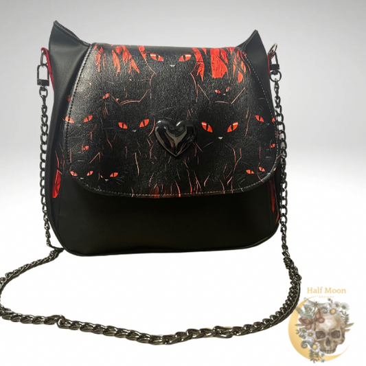 Midnight cat crossbody bag.